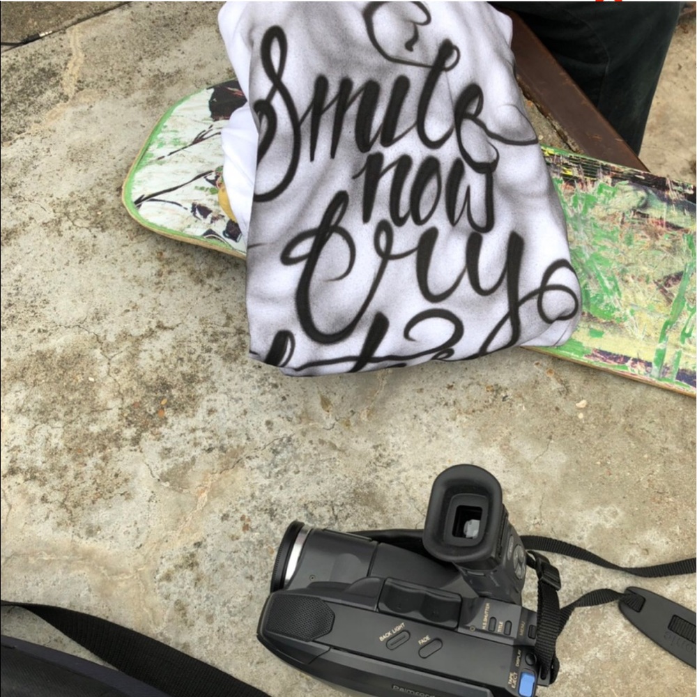 Smile now cry later air brush